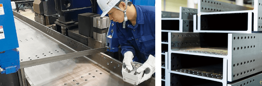 マシンでH形鋼を切断している男性 H形鋼の在庫
